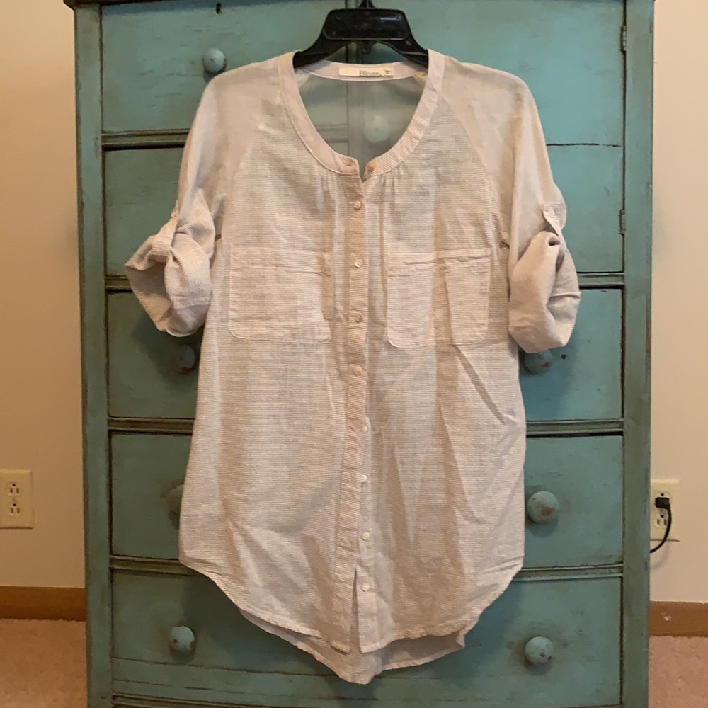 Woman’s button down top.